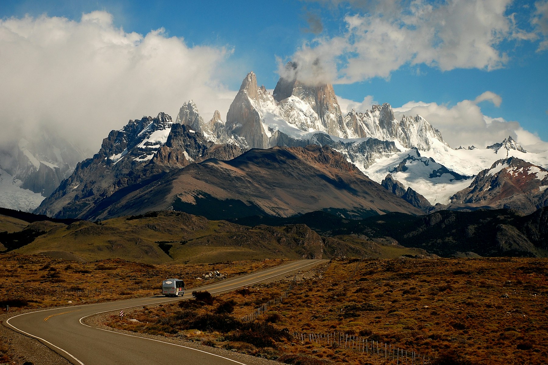 A road running through the Patagonian steppe below Mount Fitz Roy