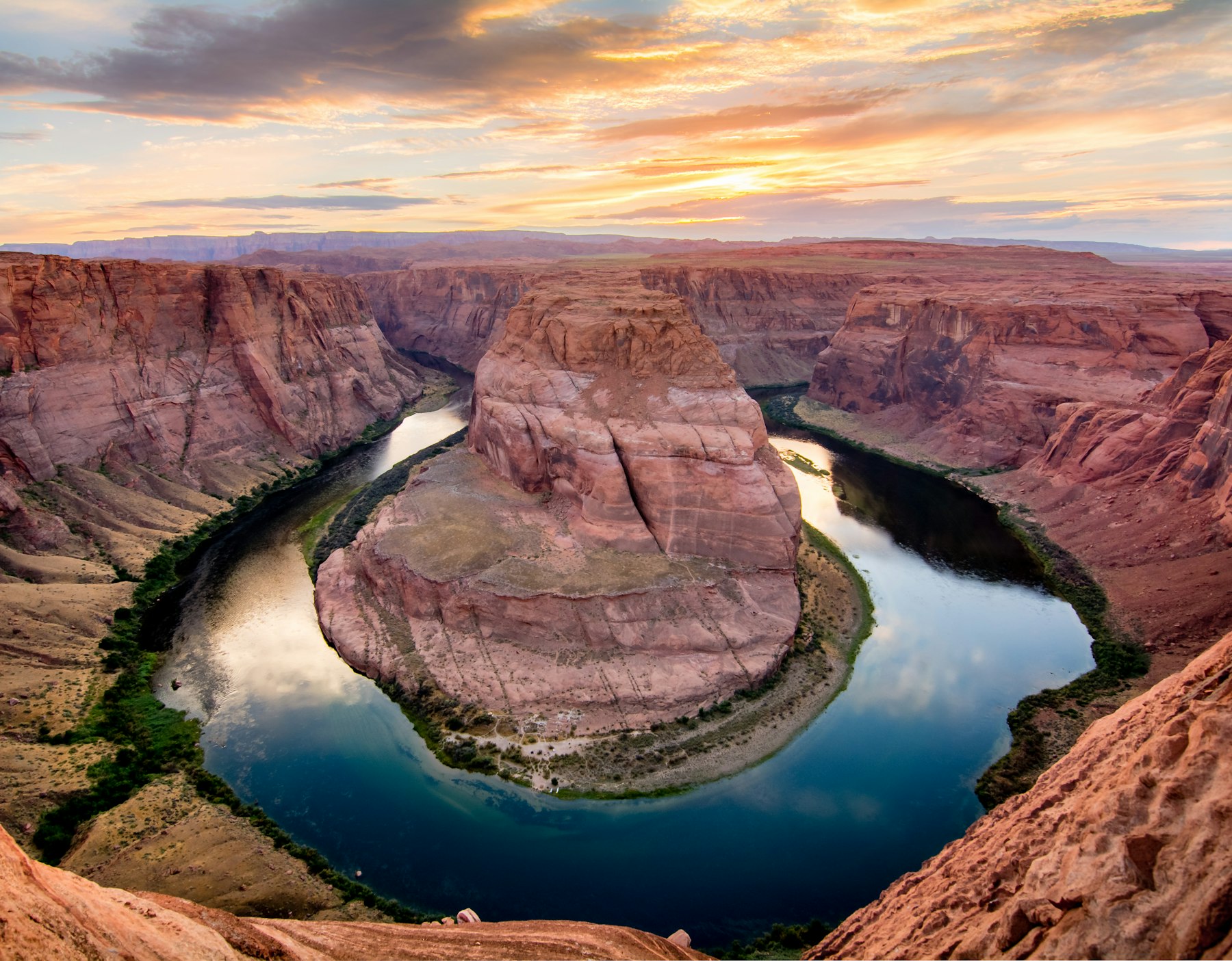 The Colorado River curving around the rock at Horseshoe Bend near Page Arizona
