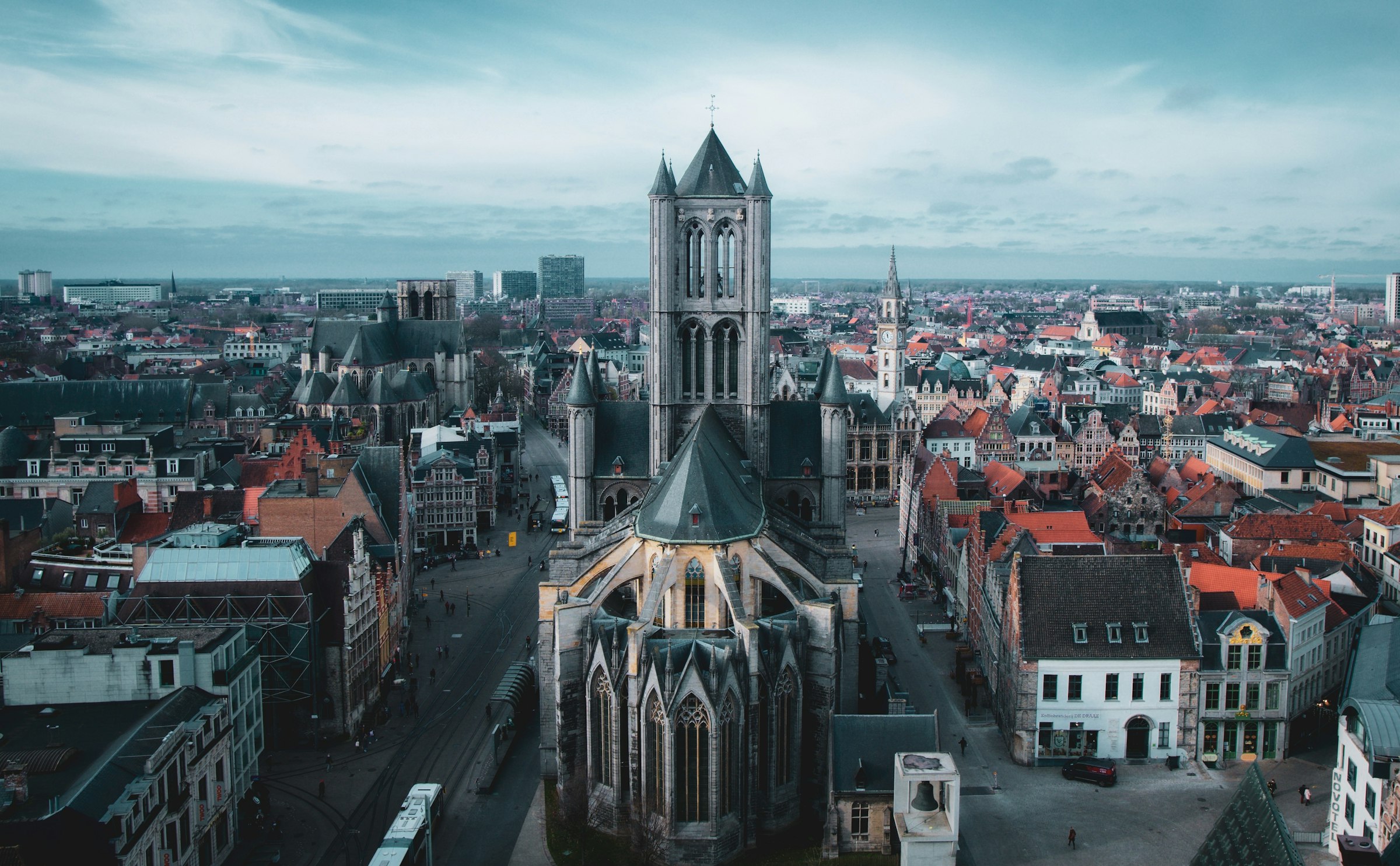 Saint Nicholas Church and the belfry above the rooftops of Ghent seen from above