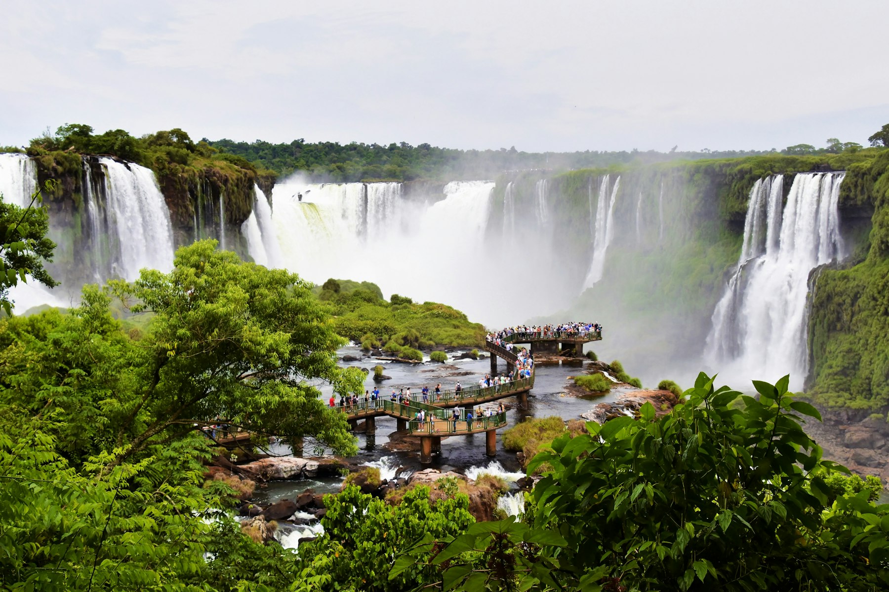 A metal walkway running out among the cataracts of the Iguazu Falls
