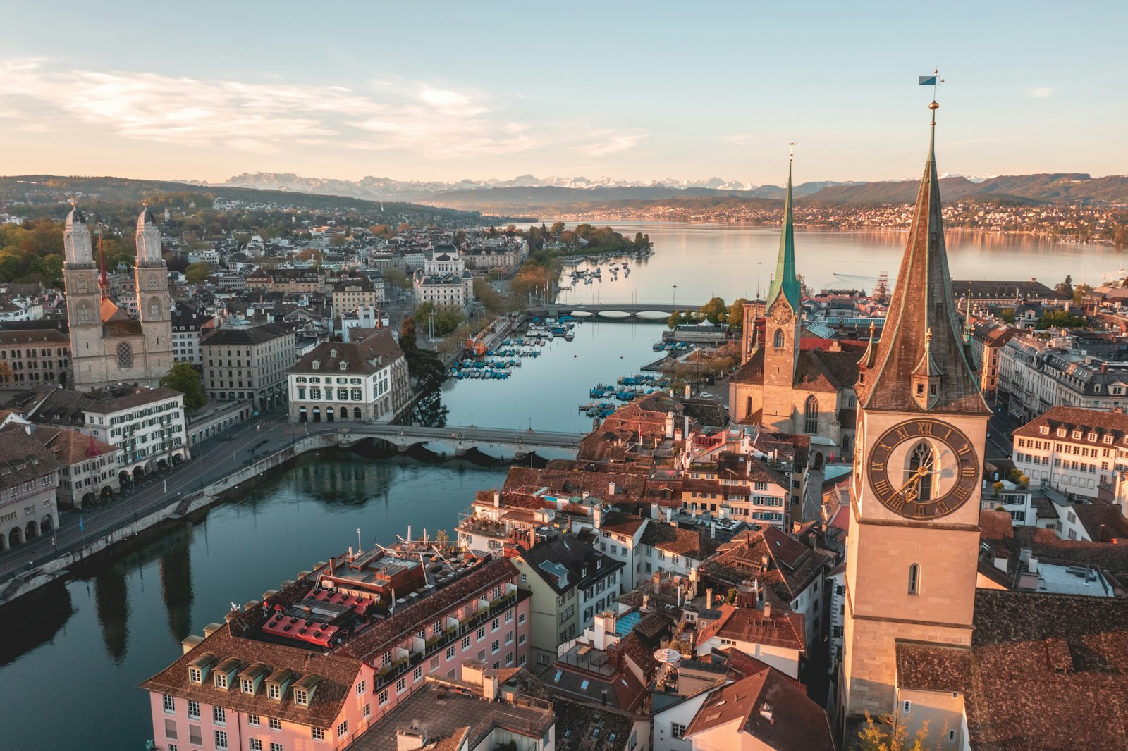 Zurich old town rooftops and church spires above the river and lake