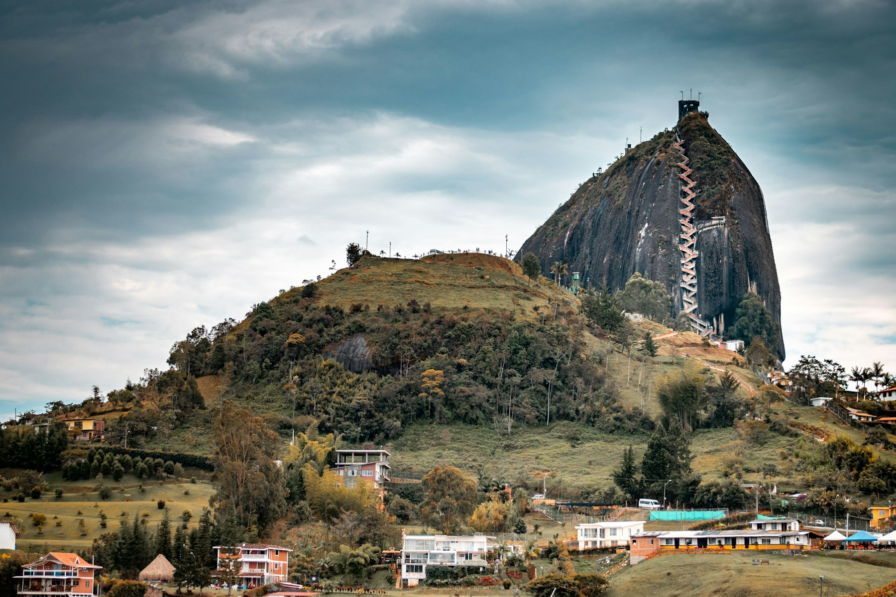 The Piedra del Penol rock with its staircase rising above the lakes at Guatape
