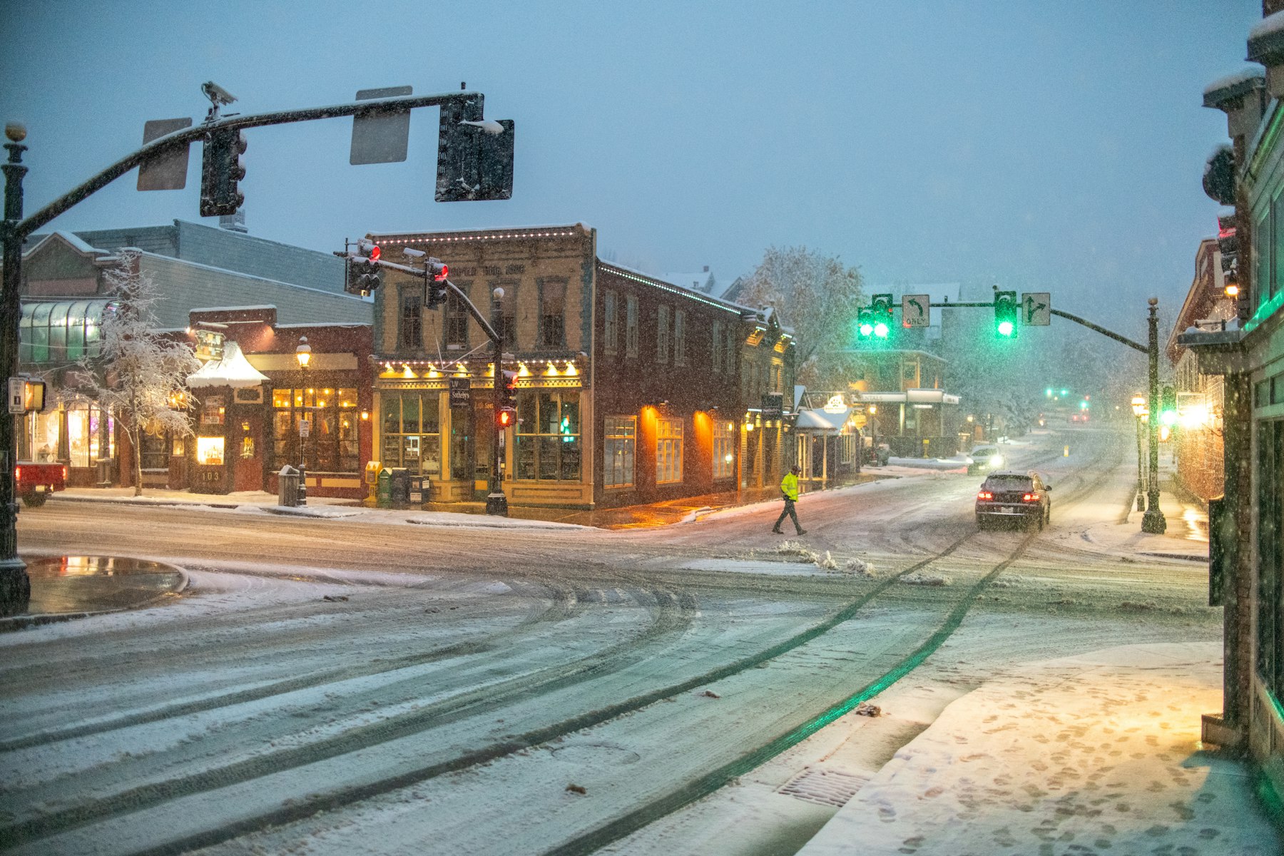 A snowy main street lined with historic storefronts in Breckenridge Colorado