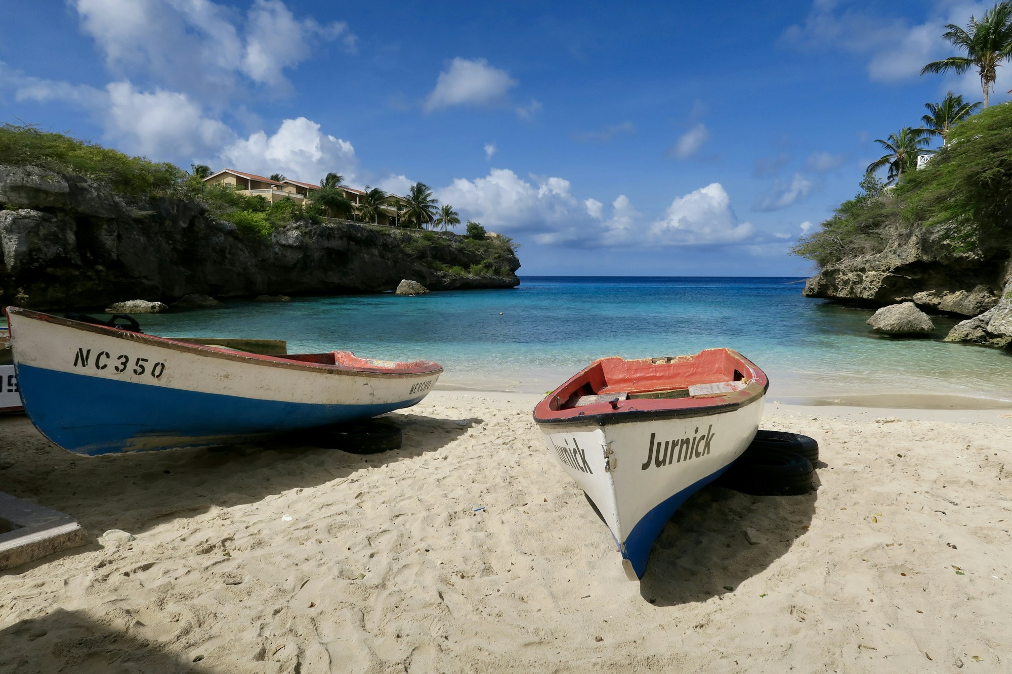 Fishing boats pulled up on the sand at Playa Lagun, Curacao