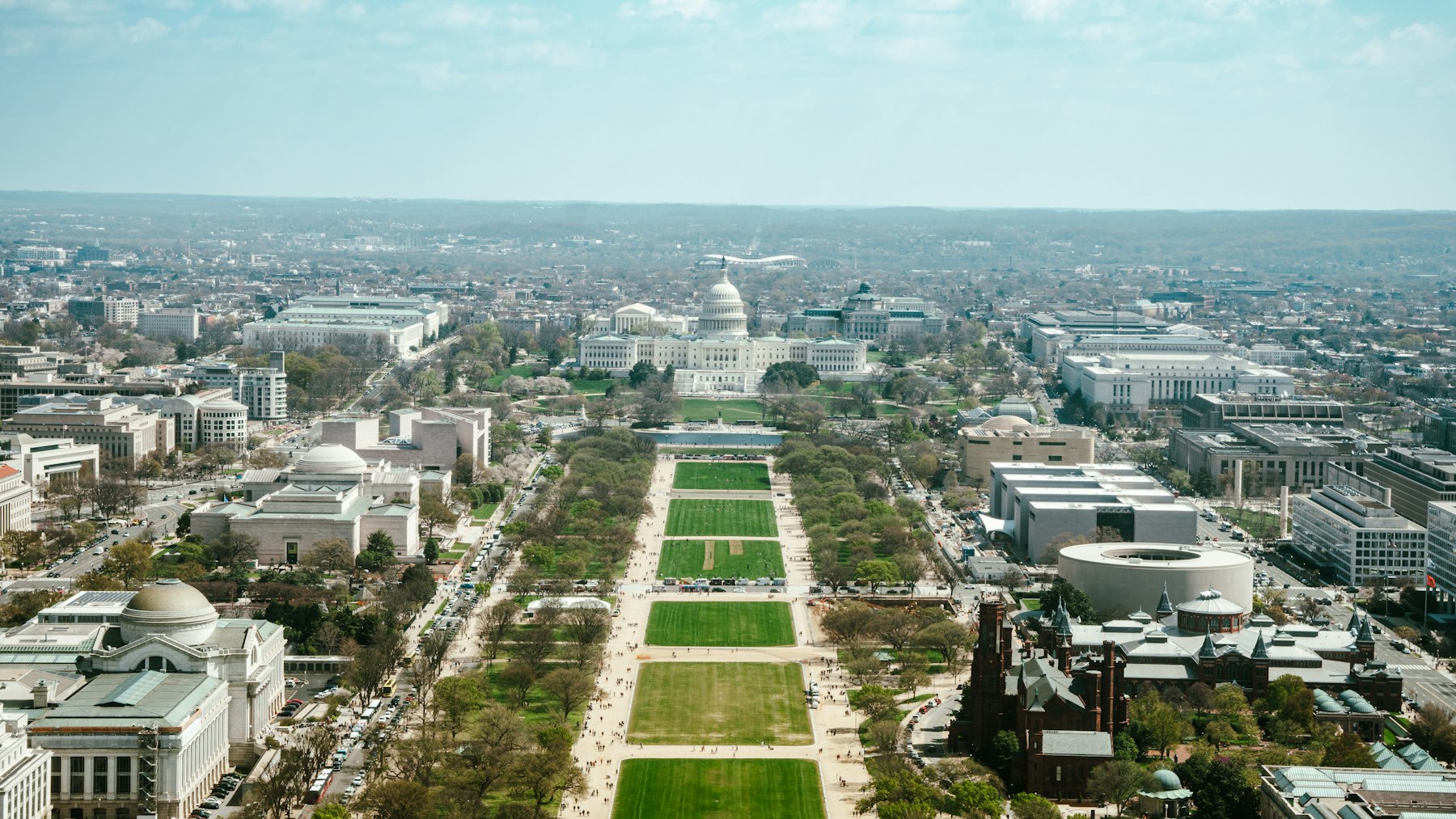 A high view looking straight down the length of the National Mall toward the Capitol dome