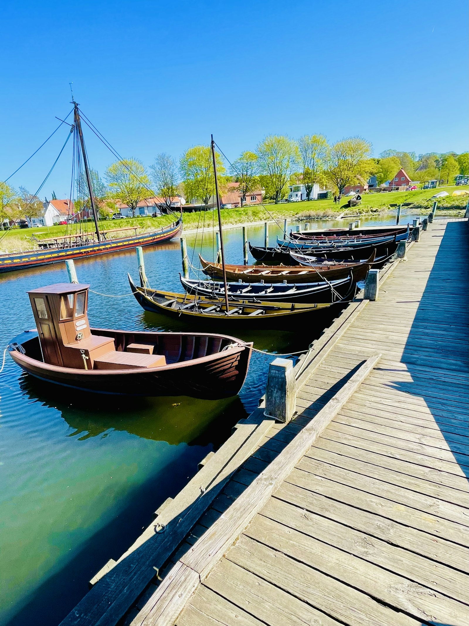Wooden Viking ship replicas moored at the harbor in Roskilde
