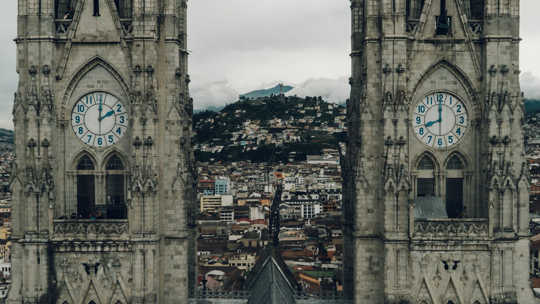 The gothic towers of the Basilica del Voto Nacional above the city of Quito