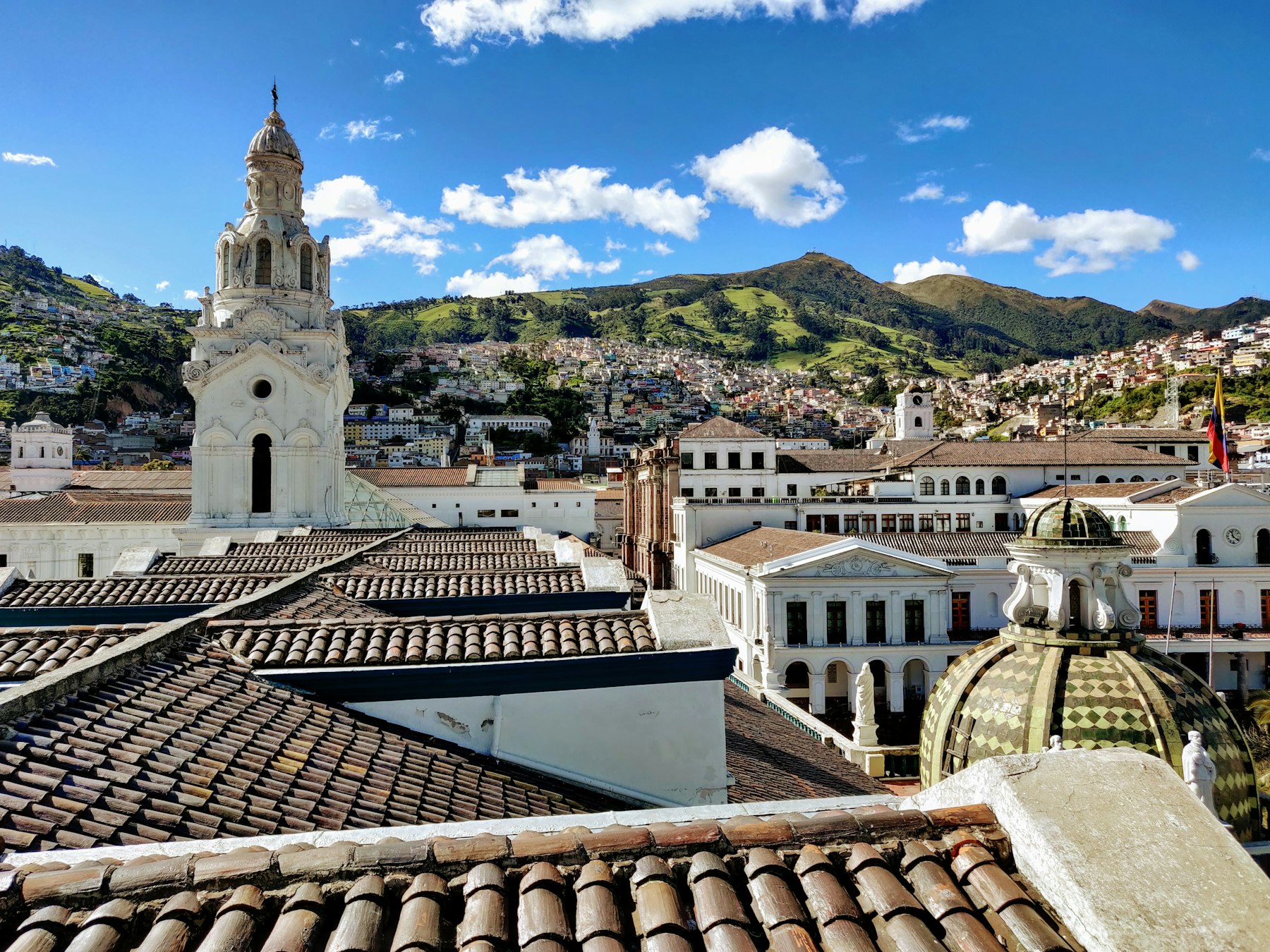 Tiled roofs and church domes in the colonial old town of Quito Ecuador
