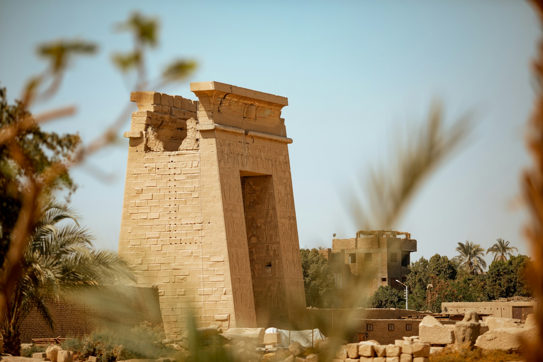 Stone columns and carvings at Karnak Temple in Luxor Egypt