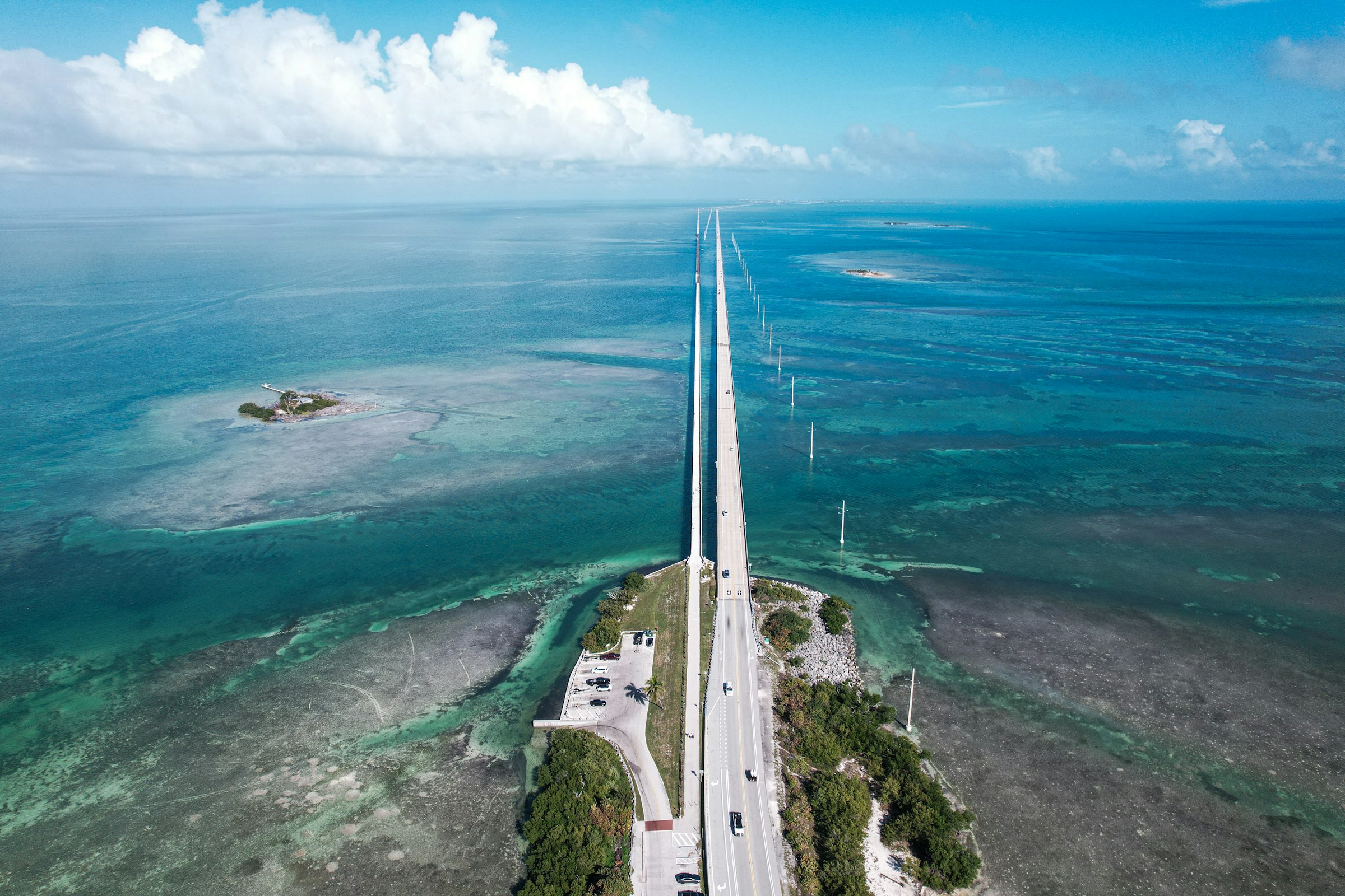 An aerial view of the Overseas Highway crossing turquoise water in the Florida Keys