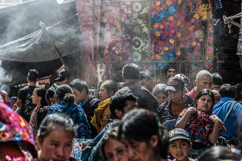 A crowded market street full of people at Chichicastenango, Guatemala