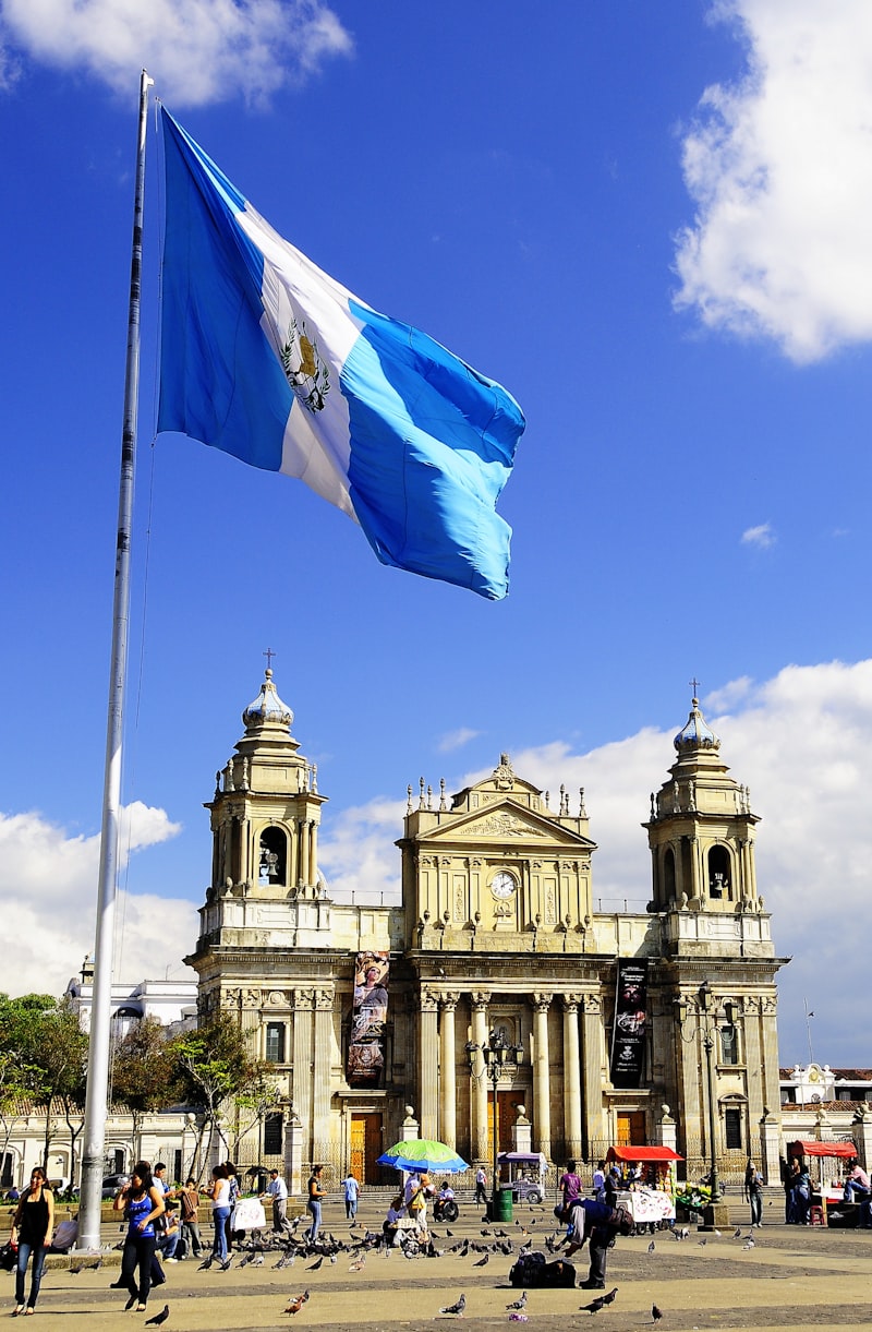 The Guatemalan flag flying above the cathedral in Guatemala City