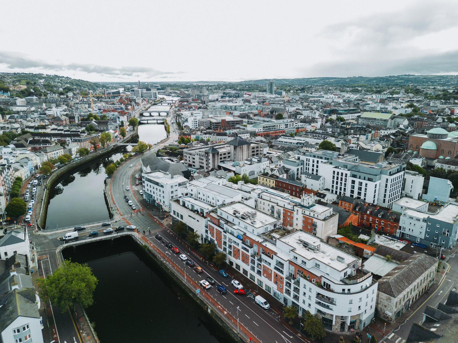 An aerial view of Cork city with the river running through the middle of it