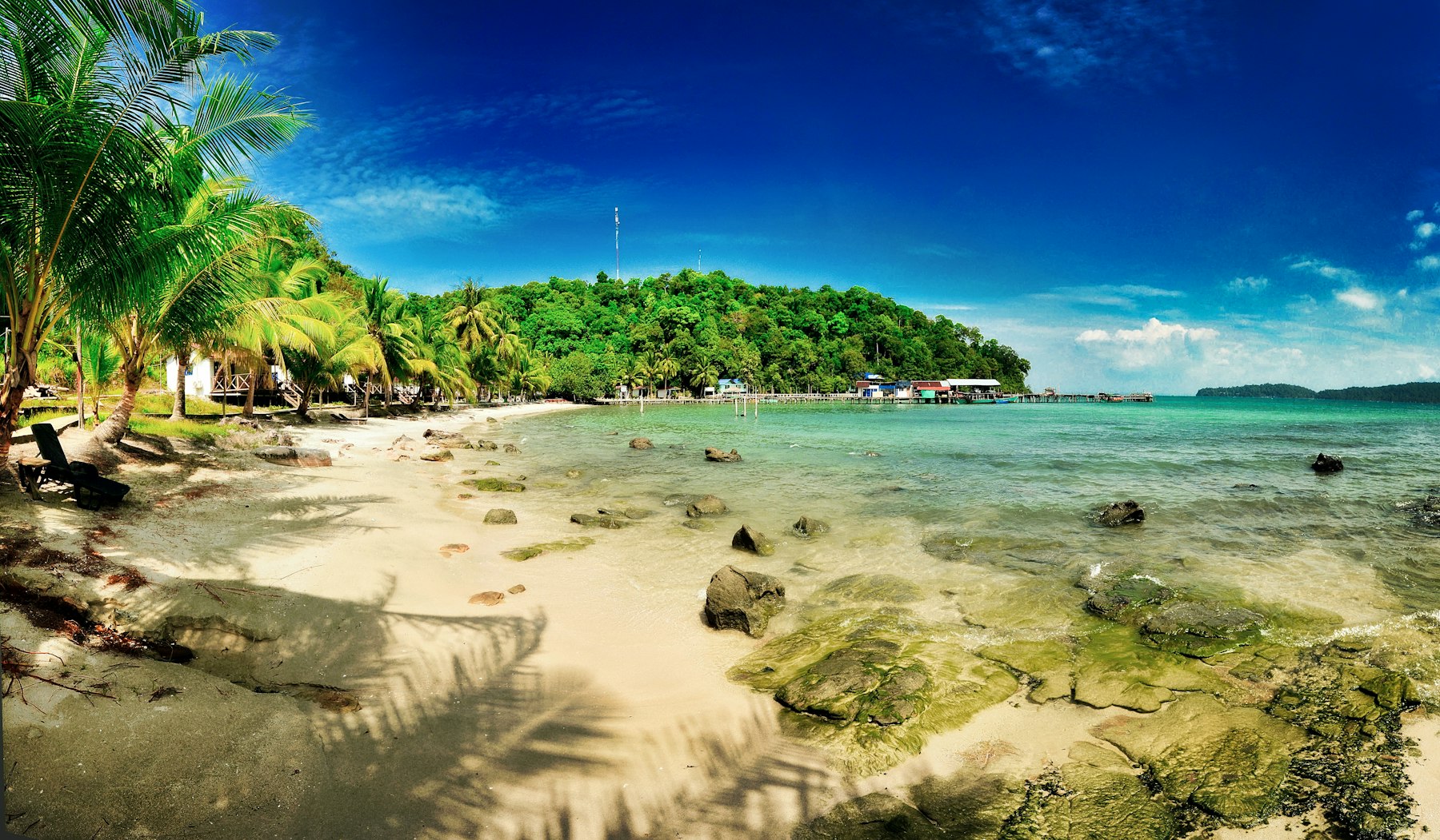 A quiet white sand bay backed by coconut palms on Koh Rong island