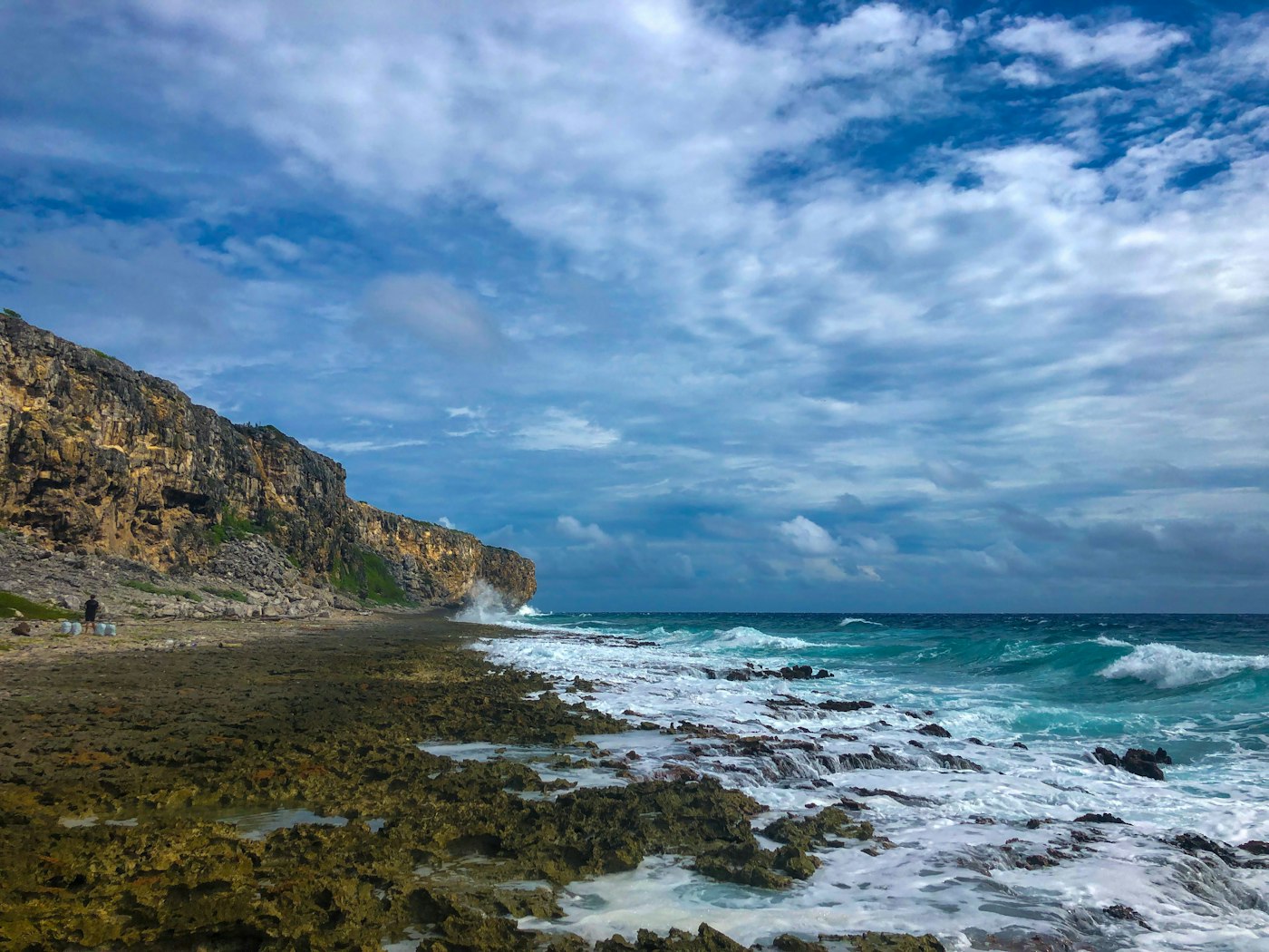 Waves breaking on the rocky bluff coastline of Cayman Brac