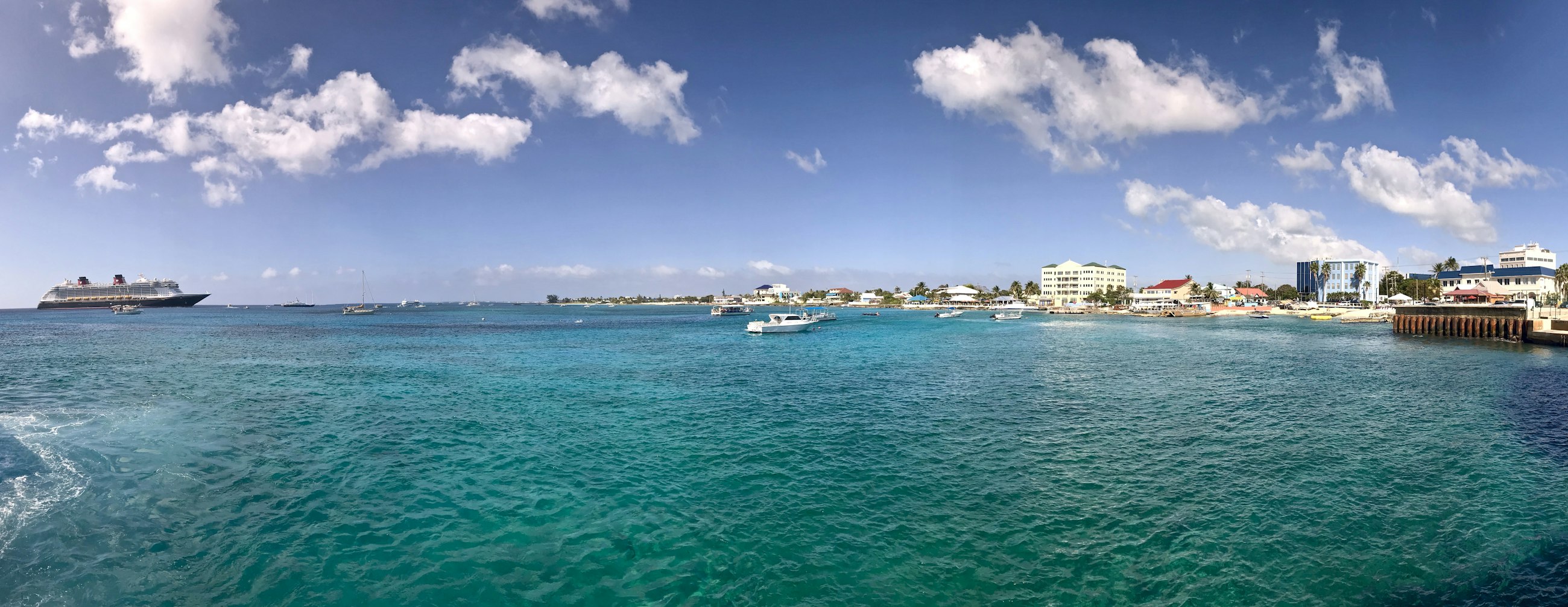 A wide view across the harbour water at the cruise terminal in George Town, Grand Cayman