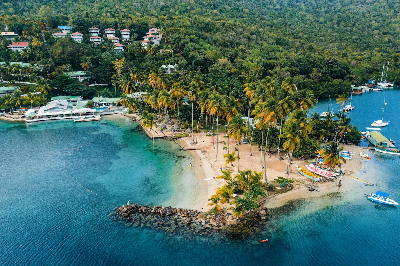 The sheltered green inlet of Marigot Bay on the west coast of Saint Lucia seen from above