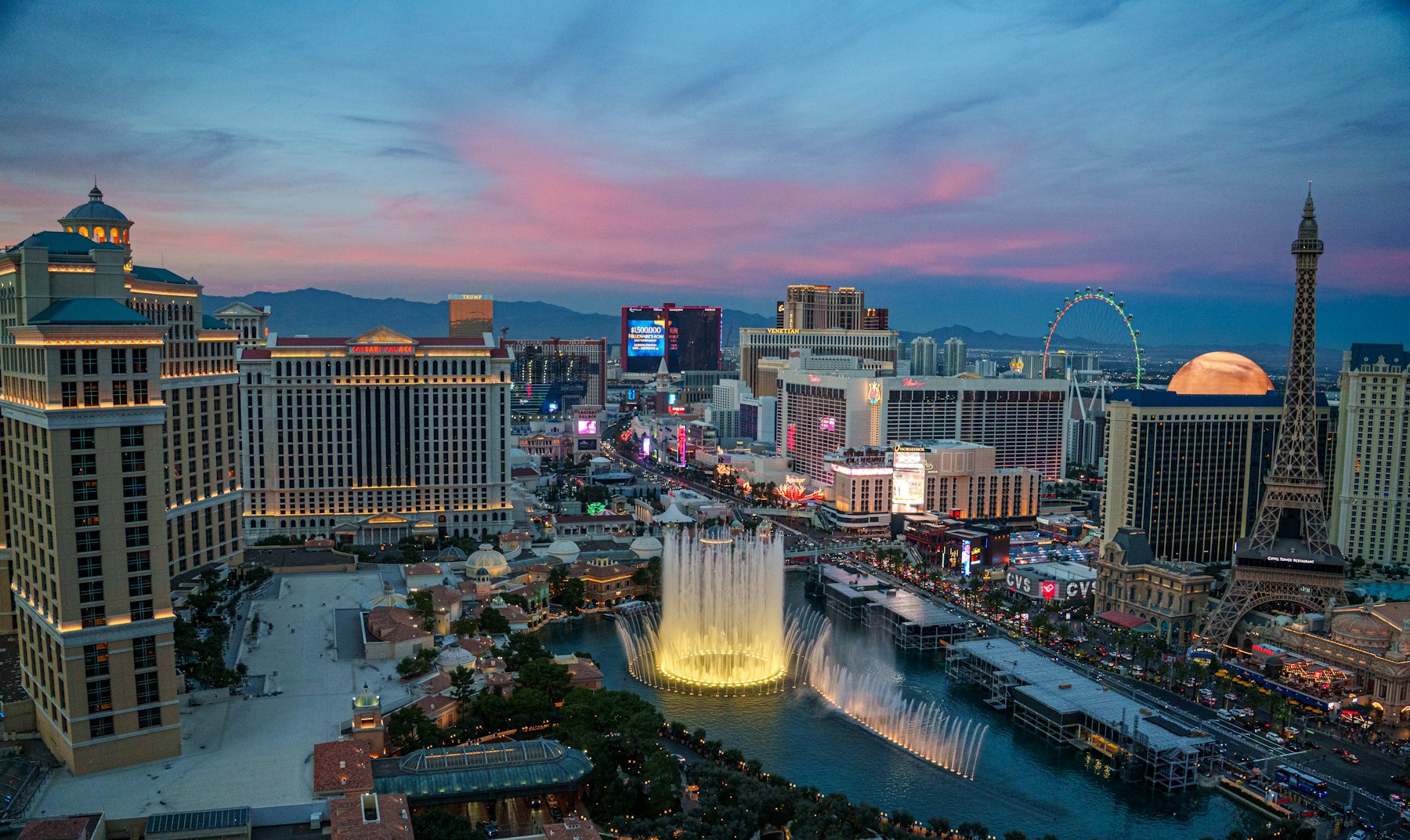 The Las Vegas Strip at twilight with the Bellagio fountains in the foreground