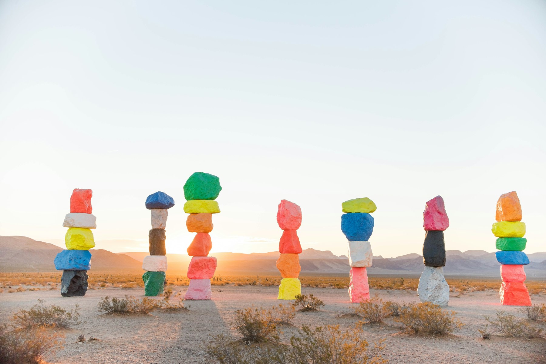 The stacked painted boulders of Seven Magic Mountains in the desert south of Las Vegas