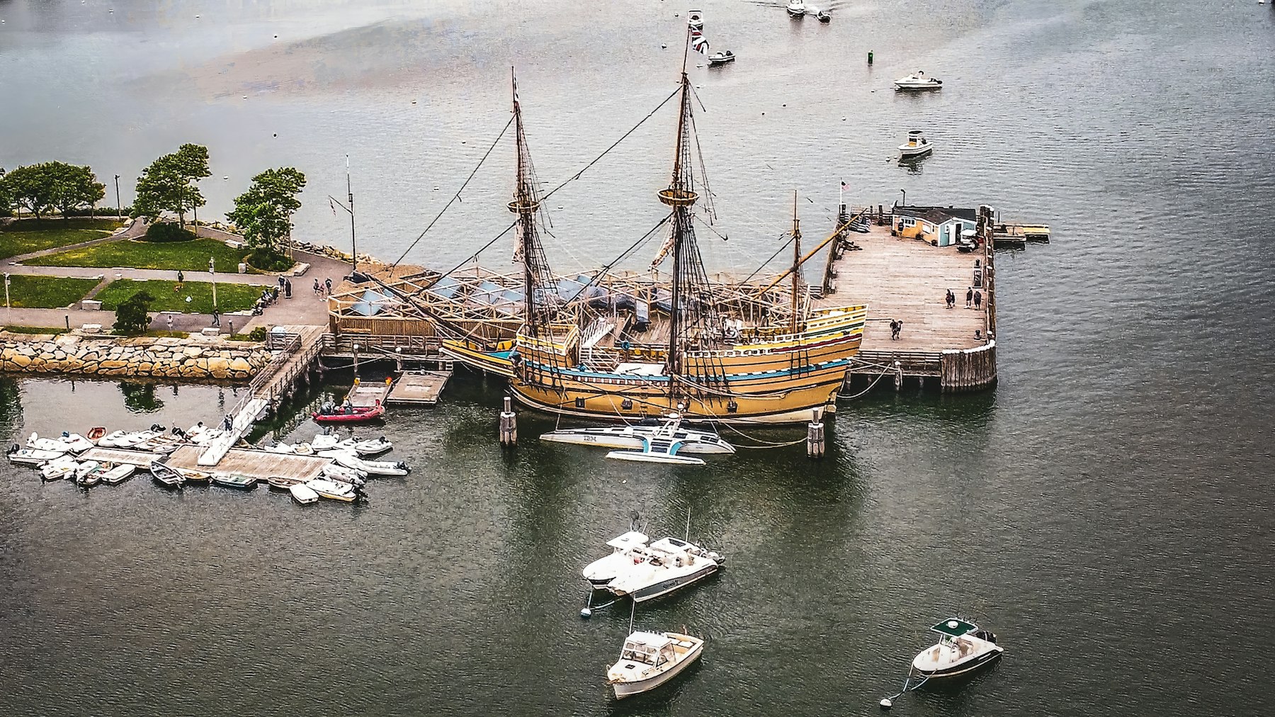 The Mayflower II tall ship docked at the State Pier in Plymouth Massachusetts seen from above