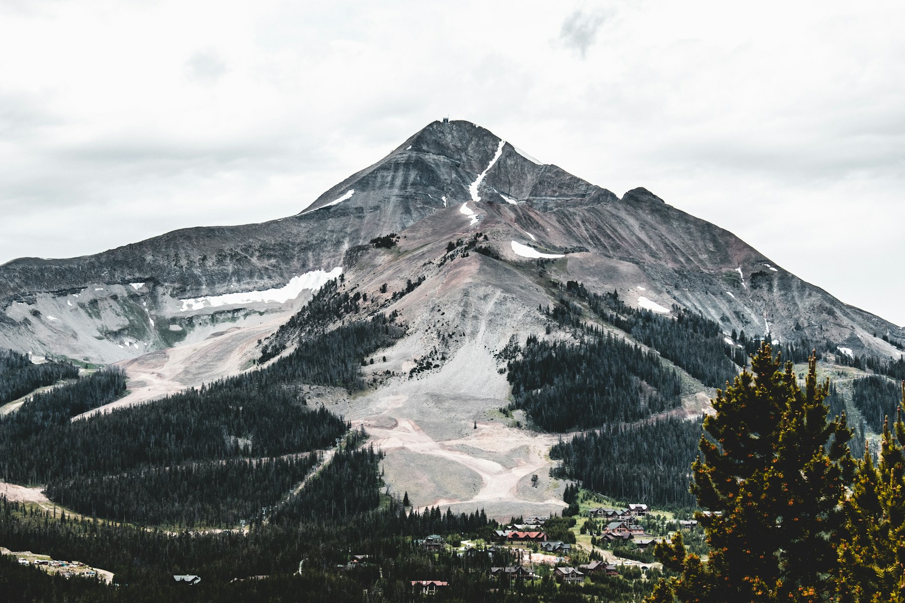 Lone Peak above the ski runs and village at Big Sky Montana
