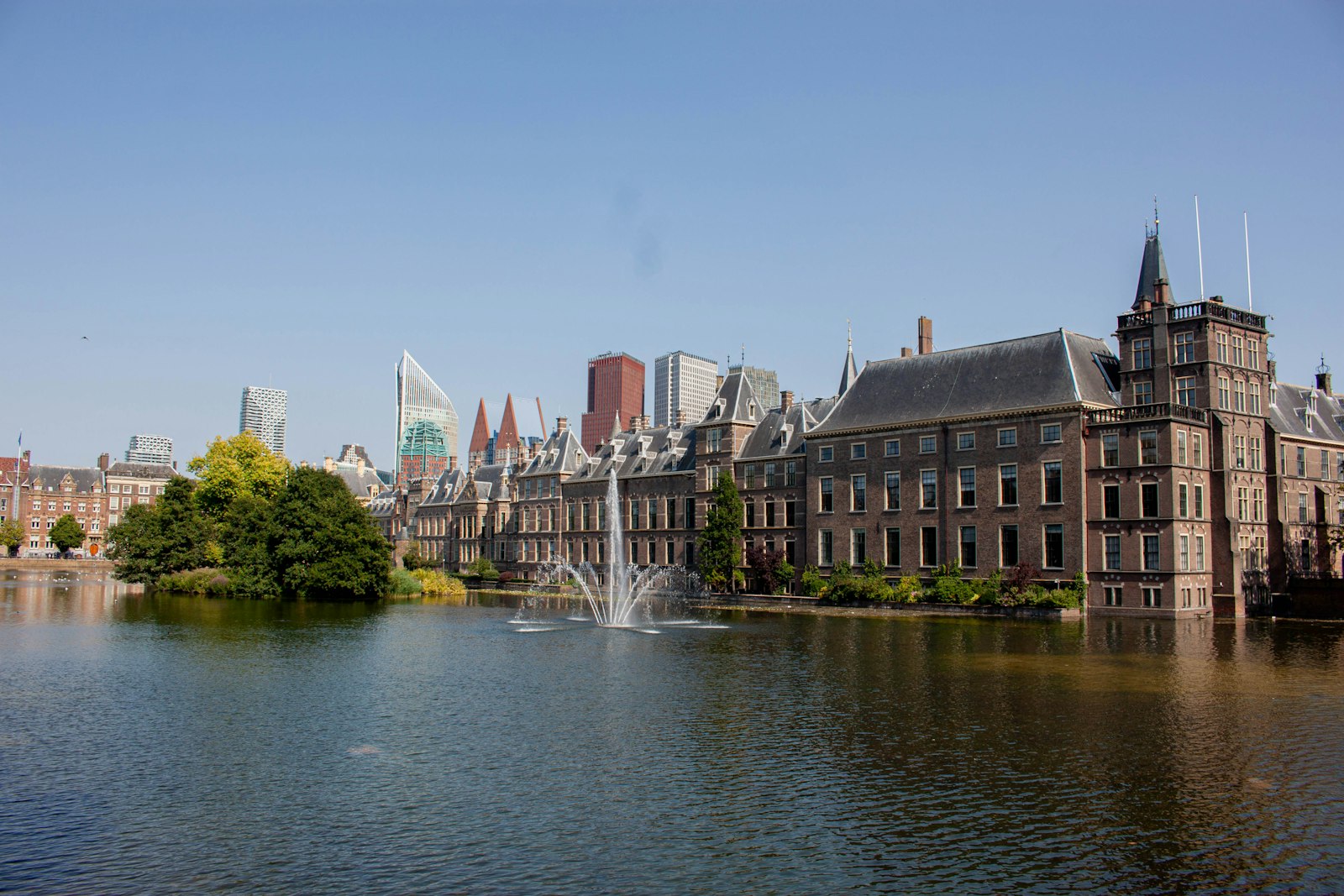 The Binnenhof parliament buildings reflected in the Hofvijver lake in The Hague