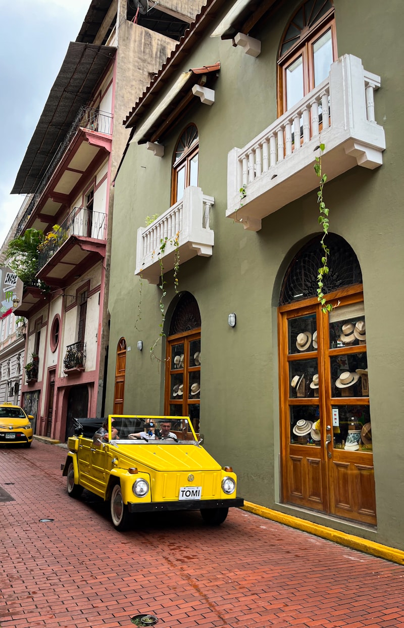An old building with wooden balconies on a street in Casco Viejo, Panama City