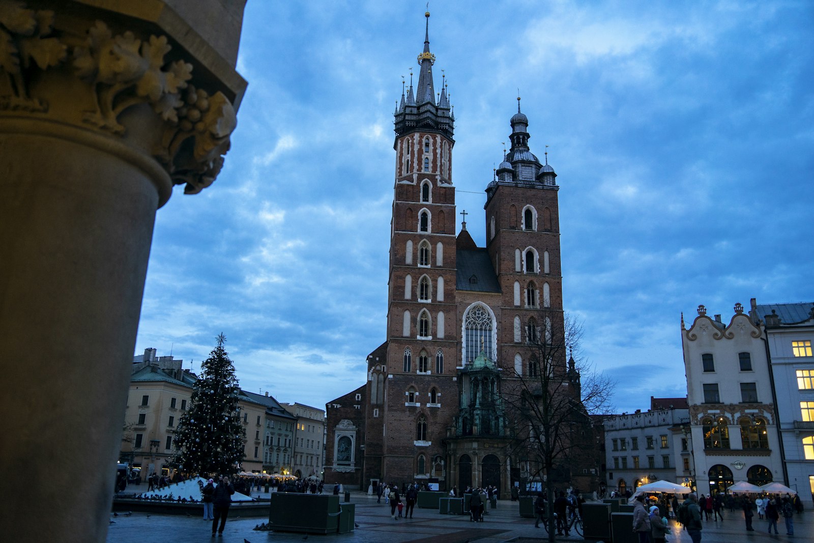 Saint Mary's Basilica rising over the main market square in Krakow in the blue hour