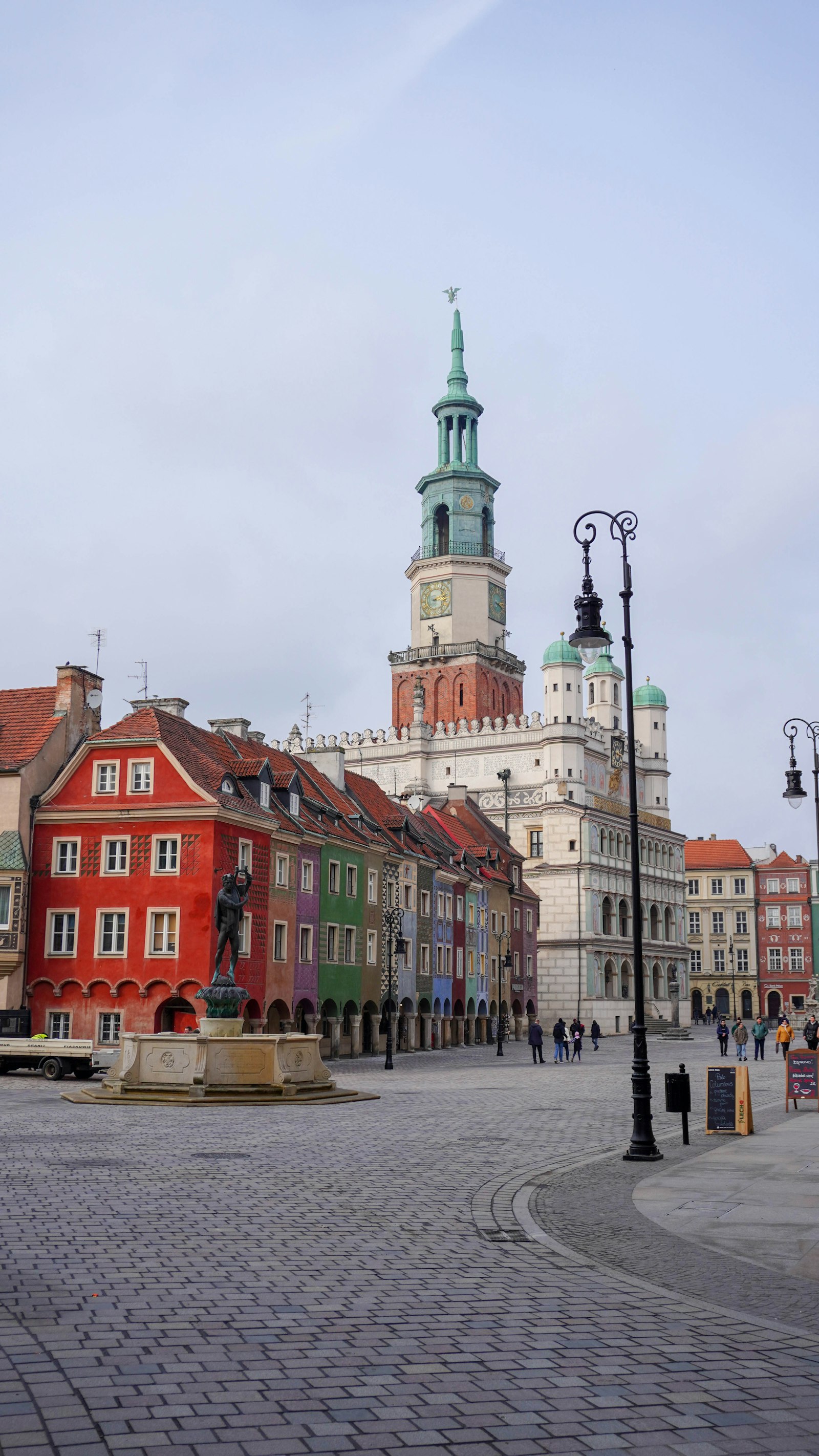 The pastel town hall and merchant houses on the old market square in Poznan