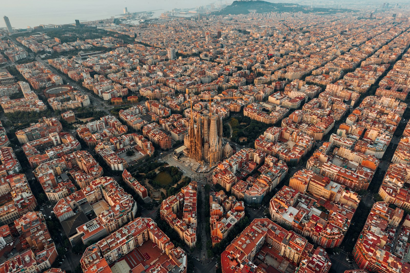 Aerial view of the Eixample grid in Barcelona with the Sagrada Familia rising out of it