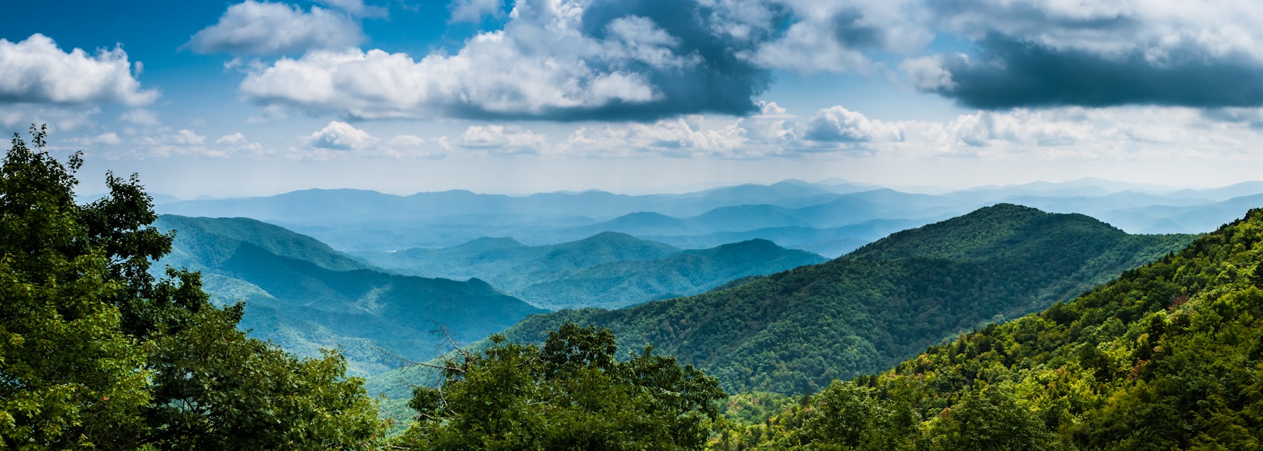 Layered blue ridges of the Great Smoky Mountains seen from an overlook in Tennessee