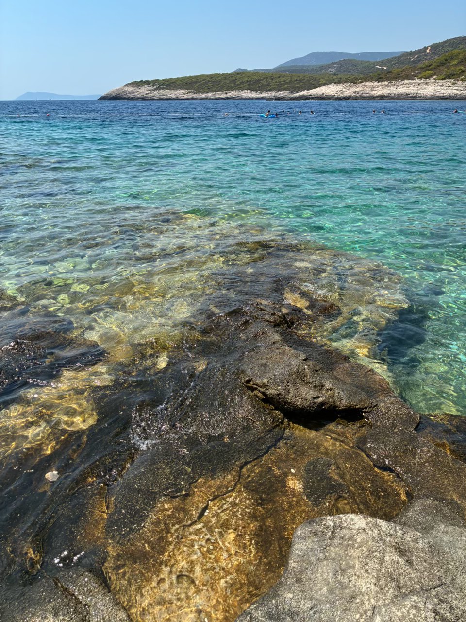 Clear water over rock at Stoncica cove on the island of Vis, Croatia