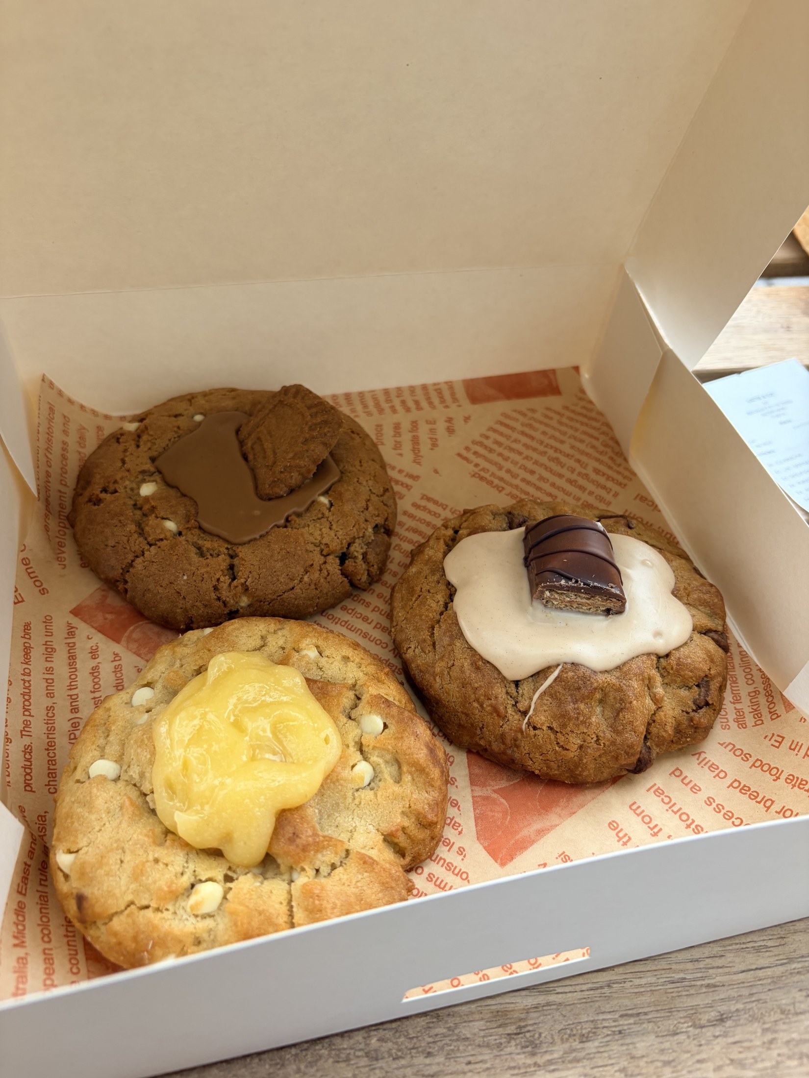 A box of pastries and cookies